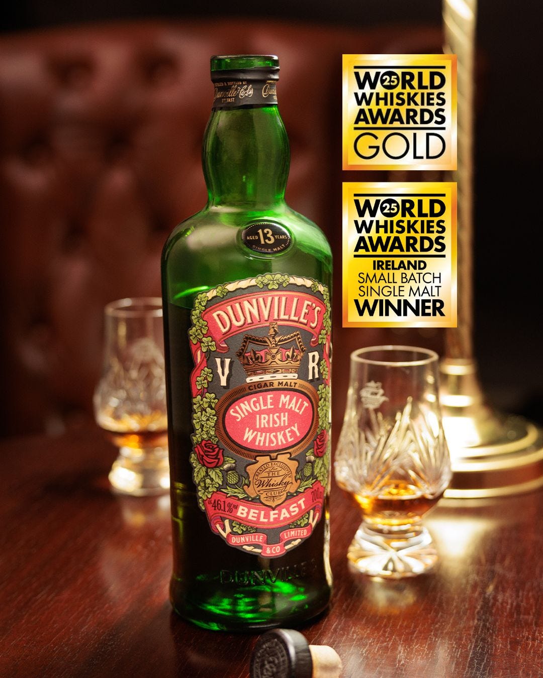 A bottle of Dunville's 13 Year Old Cigar Malt with two Glencairns