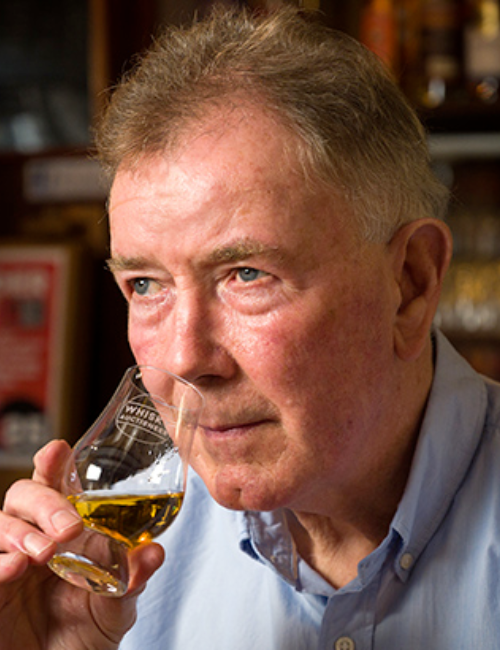 Jim McEwan from Bowmore, Bruichladdich, Ardnahoe and Cape Byron Distillery smelling a glass of whisky